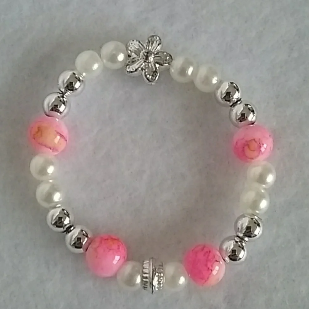 Girls floral and pink beaded bracelet